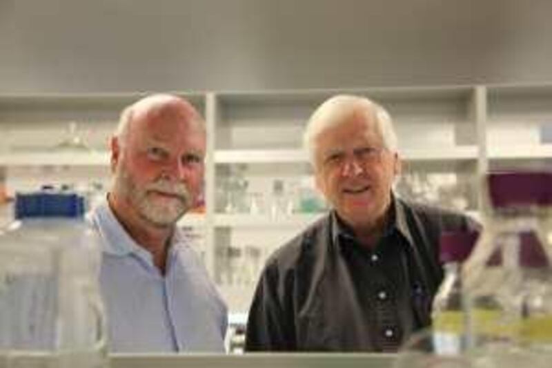 epa02166868 Undated handout photo from the J. Craig Venter Institute in San Diego, California, USA, shows genome-mapping pioneer J. Craig Venter (L) and Dr. Hamilton Smith in their lab. Scientists announced on 20 May 2010 that they produced a living cell powered by manmade DNA, a step towards the posibility of constructing artificial life. Venter said his team's project paves the way for the ultimate, much harder goal: designing organisms that work differently from the way nature intended for a wide range of uses such as turning algae into fuel.  EPA/J. CRAIG VENTER INSTITUTE/HO EDITORIAL USE ONLY/NO SALES *** Local Caption ***  02166868.jpg