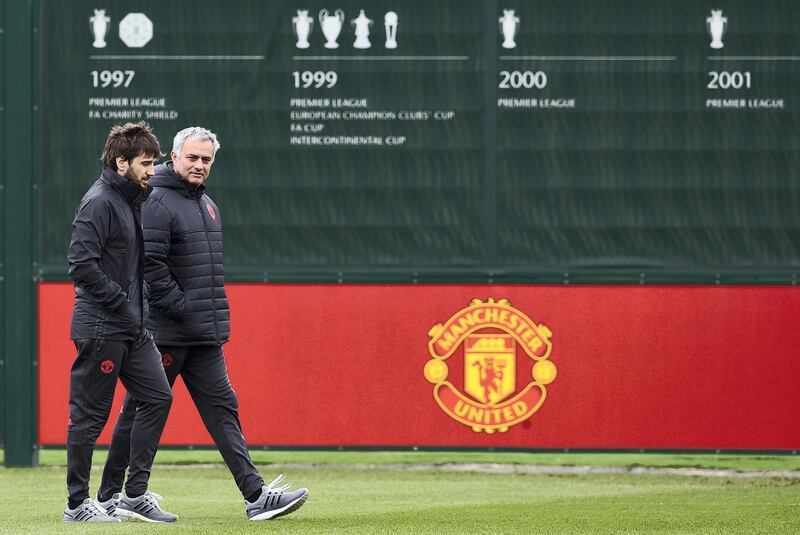 Manchester United's Portuguese manager Jose Mourinho (R) arrives to take a team training session at their Carrington base in Manchester, north west England, on April 12, 2017, on the eve of their UEFA Europa League quarter-final football match against Anderlecht.  / AFP PHOTO / Paul ELLIS