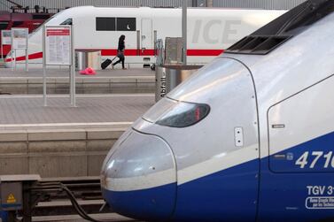 A high speed train  made by French trainmaker Alstom stops next to a German model made by Siemens. The two companies, which are offering fresh concessions to save their rail merger deal, say they have already identified potential acquirers. Photo: Reuters