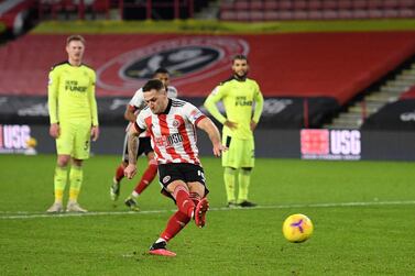 Sheffield United substitute Billy Sharp fires home from the penalty spot to earn his side three points against Newcastle at Bramall Lane. AFP