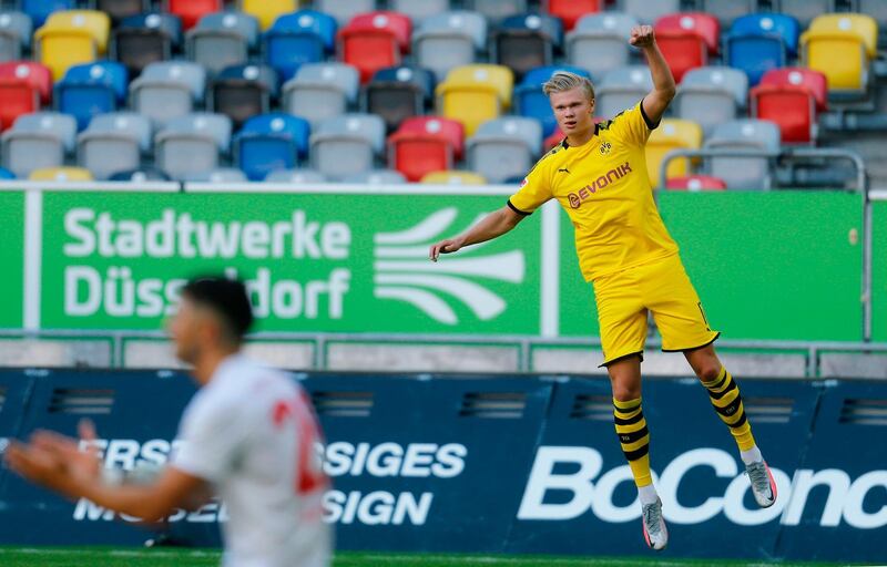 Dortmund's Norwegian forward Erling Braut Haaland celebrates after scoring the winner against Fortuna Duesseldorf. AFP