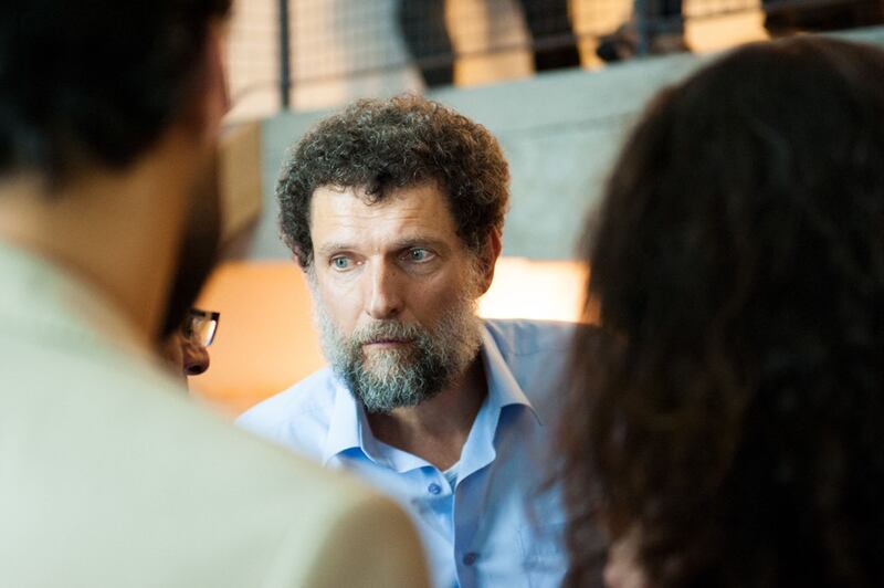 Turkish philanthropist Osman Kavala, seen in Istanbul in 2021, has been sent to jail for life without parole. AFP