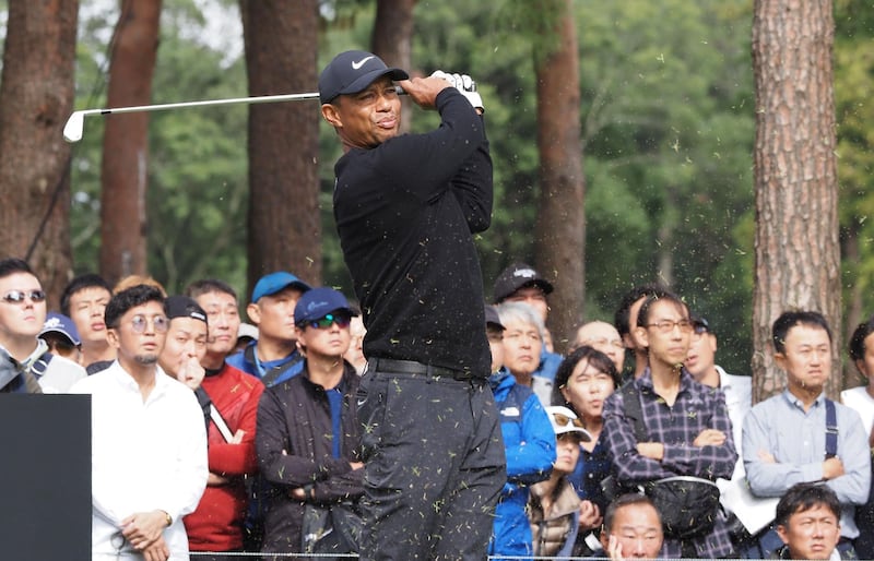 Tiger Woods tees off at the second hole. AFP