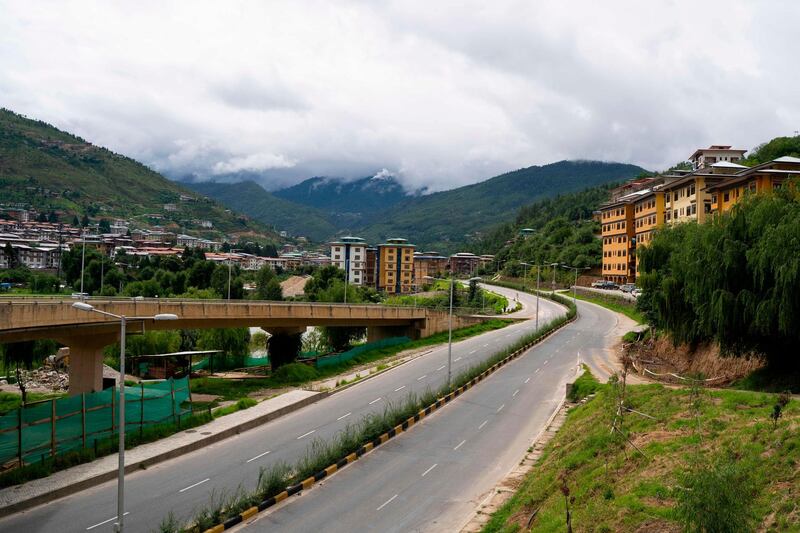 General view of a deserted road during a government-imposed nationwide lockdown in Bhutan's capital Thimpu. AFP