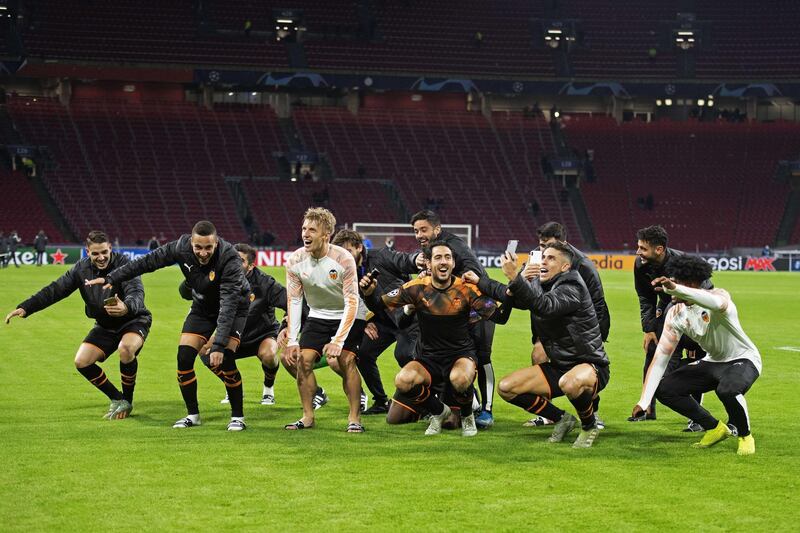 Valencia players react after their 1-0 win over Ajax. EPA