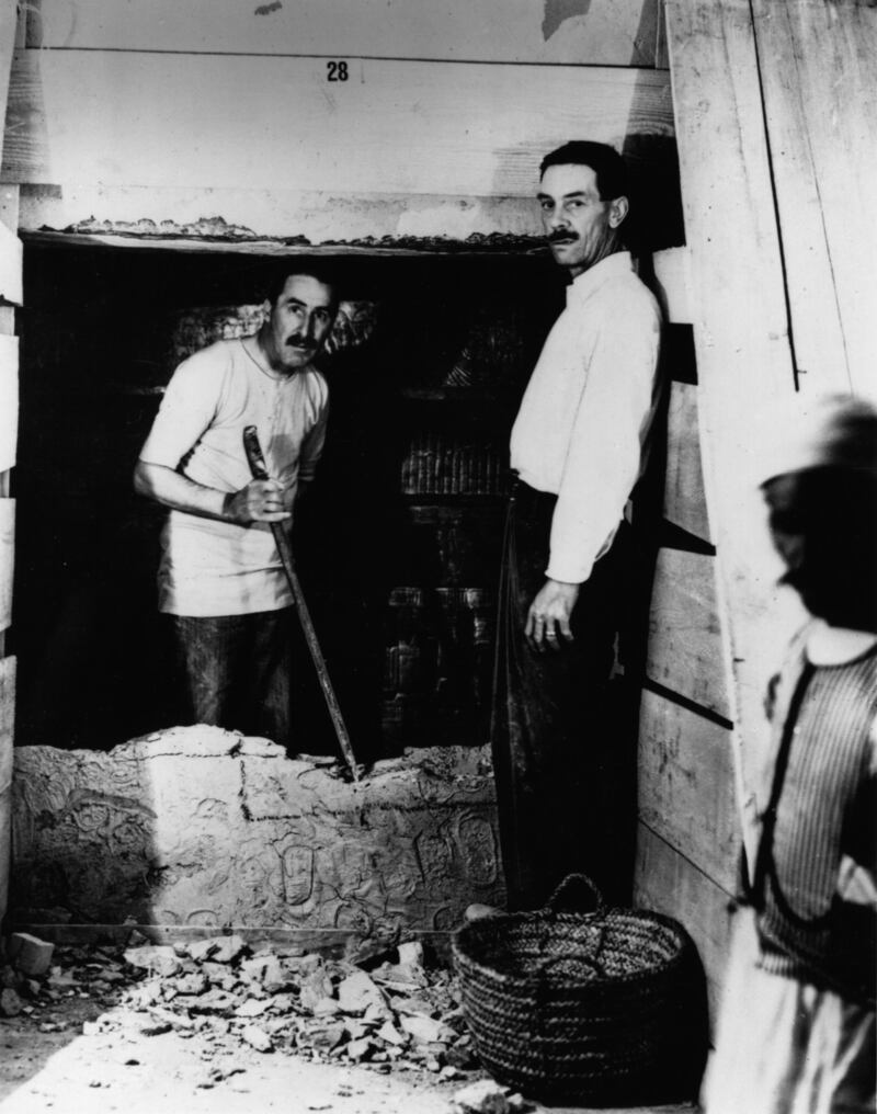Carter opening the wall of the inner chamber of Tutankhamun's tomb. 