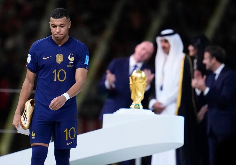 Kylian Mbappe with the Golden Boot award for top goalscorer at the 2022 World Cup in Qatar after France lost in the final against Argentina. AP