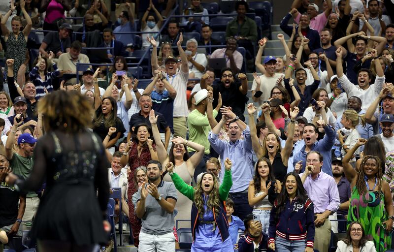 Fans cheer Serena Williams. AFP