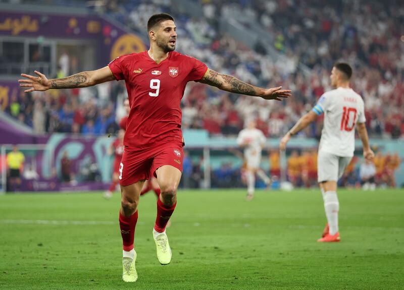 Aleksandar Mitrovic celebrates after scoring for Serbia. Getty