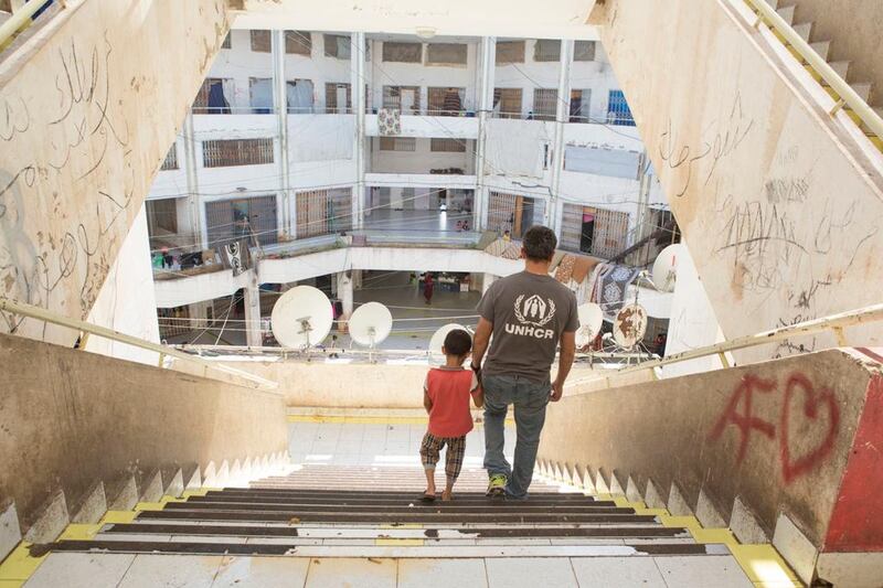 Bassem Youssef, an Egyptian comedian and satirist, with Aloush, seven-year-old boy and Syrian refugee. Courtsey UNHCR 