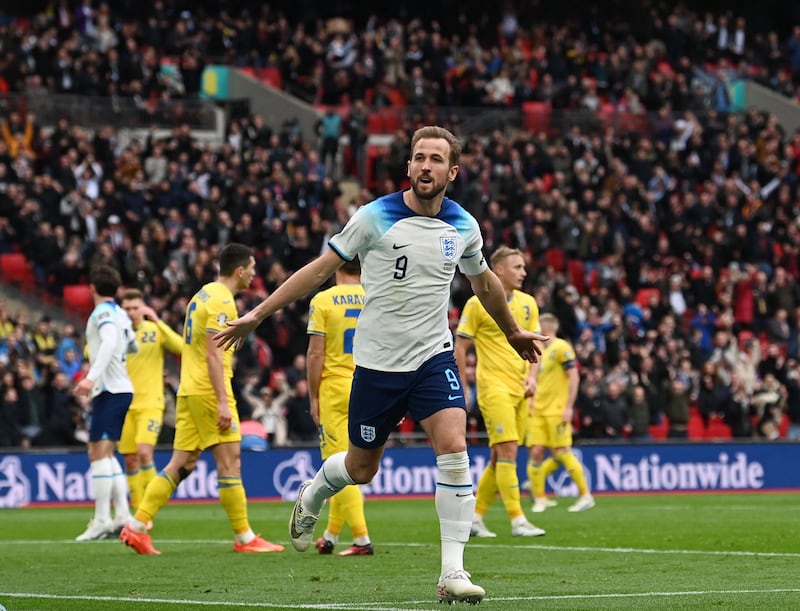England striker Harry Kane celebrates scoring the first goal against Ukraine at Wembley Stadium on March 26, 2023. AFP