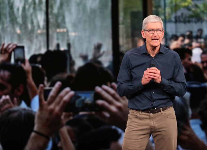 Tim Cook, chief executive officer of Apple, speaks during the event. AFP