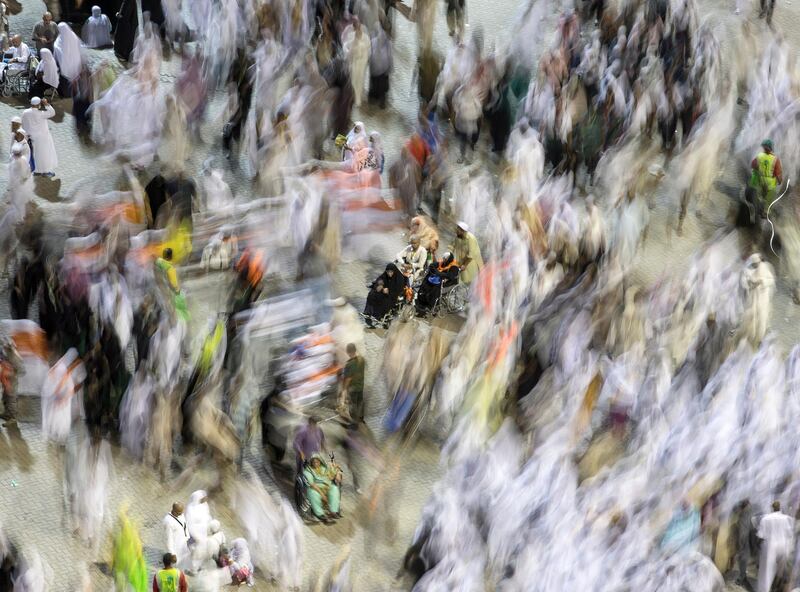 A long exposure photo shows Muslim pilgrims arrive to throw stones towards the symbolic devil represented by a Jamarat (Burning Coal) on the last day of the Muslims Hajj 2018 pilgrimage in the tent City of Mina near Mecca, Saudi Arabia. EPA
