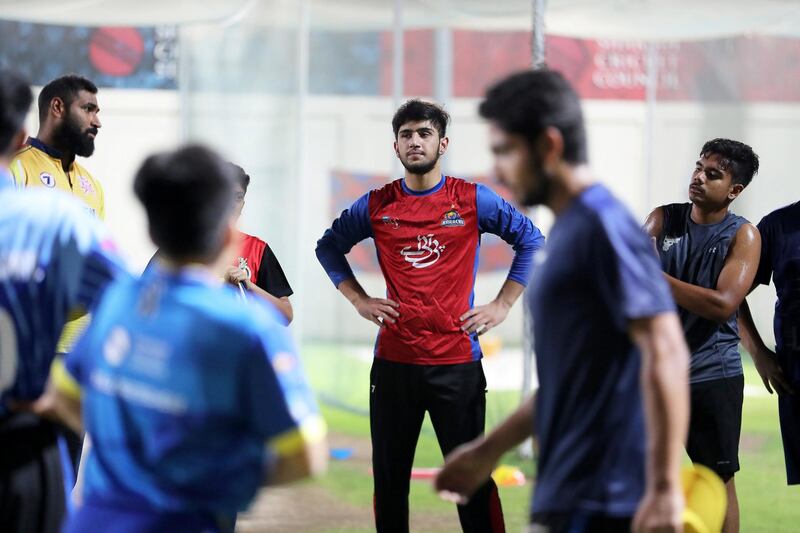 Hassan Khan (center) the son of Afghanistan/IPL star Mohammed Nabi, during the training at Sharjah Cricket Academy in Sharjah on May 10,2021. Pawan Singh / The National. Story by Paul