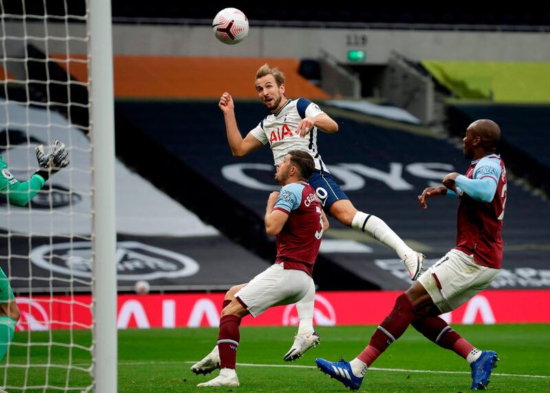 Harry Kane heads home to make it 3-0 to Spurs. AFP