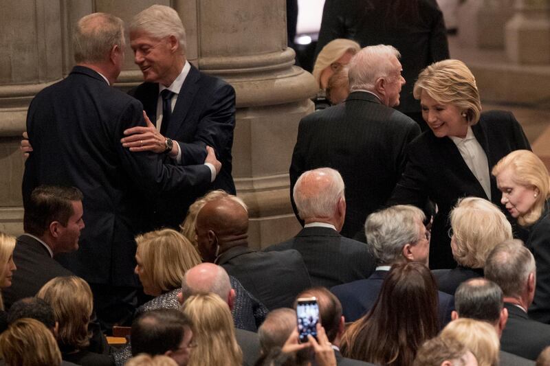 Former Vice President Al Gore, lfet, greets former President Clinton as his wife Hillary Clinton greets former Vice President Biden before a State Funeral. EPA