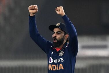 India's captain Virat Kohli celebrates after win at the end of the fifth and final Twenty20 international cricket match against England at the Narendra Modi Stadium in Motera on March 20, 2021. IMAGE RESTRICTED TO EDITORIAL USE - STRICTLY NO COMMERCIAL USE / AFP / Jewel SAMAD / IMAGE RESTRICTED TO EDITORIAL USE - STRICTLY NO COMMERCIAL USE