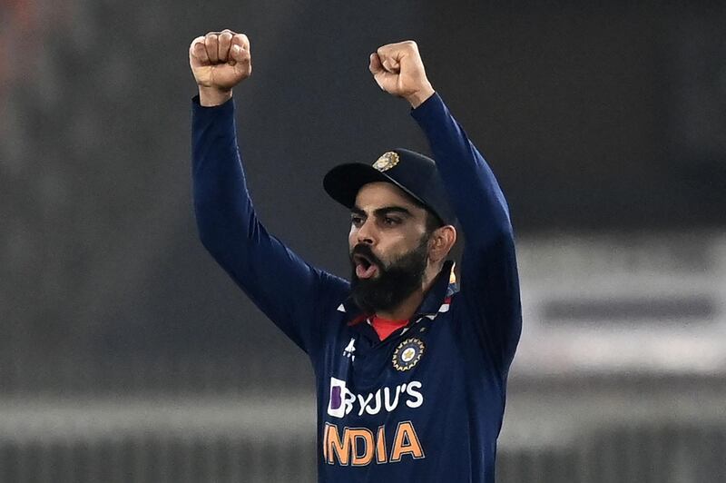 India's captain Virat Kohli celebrates after win at the end of the fifth and final Twenty20 international cricket match against England at the Narendra Modi Stadium in Motera on March 20, 2021. IMAGE RESTRICTED TO EDITORIAL USE - STRICTLY NO COMMERCIAL USE
 / AFP / Jewel SAMAD / IMAGE RESTRICTED TO EDITORIAL USE - STRICTLY NO COMMERCIAL USE
