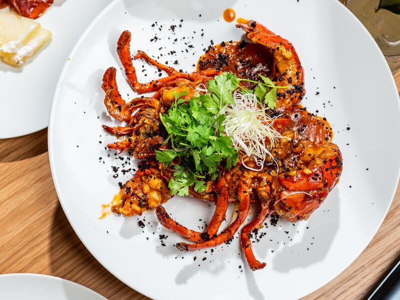 The wok-fried angry lobster is a signature dish and a must-try. Photo: Spago by Wolfgang Puck