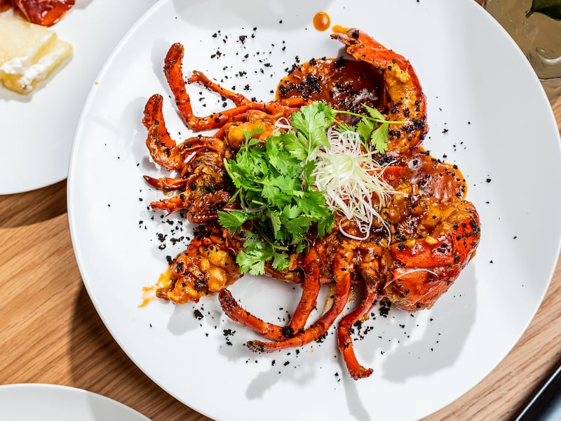 The wok-fried angry lobster is a signature dish and a must-try. Photo: Spago by Wolfgang Puck