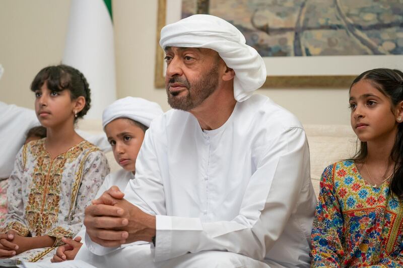 ABU DHABI, UNITED ARAB EMIRATES - May 19, 2020: HH Sheikh Mohamed bin Zayed Al Nahyan, Crown Prince of Abu Dhabi and Deputy Supreme Commander of the UAE Armed Forces (2nd R), participates in an online lecture by HE Obaid Rashid Al Shamsi, Director-General of the National Emergency Crisis and Disaster Management Authority, titled “Honoring Our Traditions, Valuing Our Safety”. The lecture was broadcast on Al Emarat Channel as part of the Ramadan lecture series of Majlis Mohamed bin Zayed. Seen with HH Sheikha Shamma bint Khaled bin Mohamed bin Zayed Al Nahyan (R), HH Sheikh Mohamed bin Nahyan bin Saif Al Nahyan (3rd R) and HH Sheikha Fatima bint Mohamed bin Hamad bin Tahnoon Al Nahyan (4th R).

( Hamad Al Kaabi / Ministry of Presidential Affairs )​
---