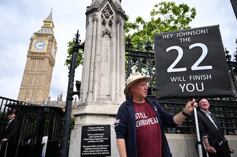 A protester outside Parliament in London. Getty