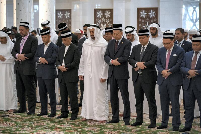 ABU DHABI, UNITED ARAB EMIRATES - June 14, 2019: HH Sheikh Mohamed bin Zayed Al Nahyan, Crown Prince of Abu Dhabi and Deputy Supreme Commander of the UAE Armed Forces (5th R) and HM King Sultan Abdullah Sultan Ahmad Shah of Malaysia (6th R), attend Friday prayers at the Sheikh Zayed Grand Mosque. Seen with members of the Malaysian delegation.

( Hamad Al Kaabi / Ministry of Presidential Affairs )​
---