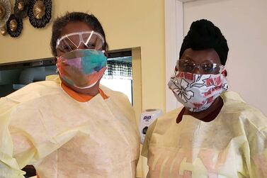 Healthcare workers wear masks made by Masks for NY volunteers. Courtesy Queens Center for Progress
