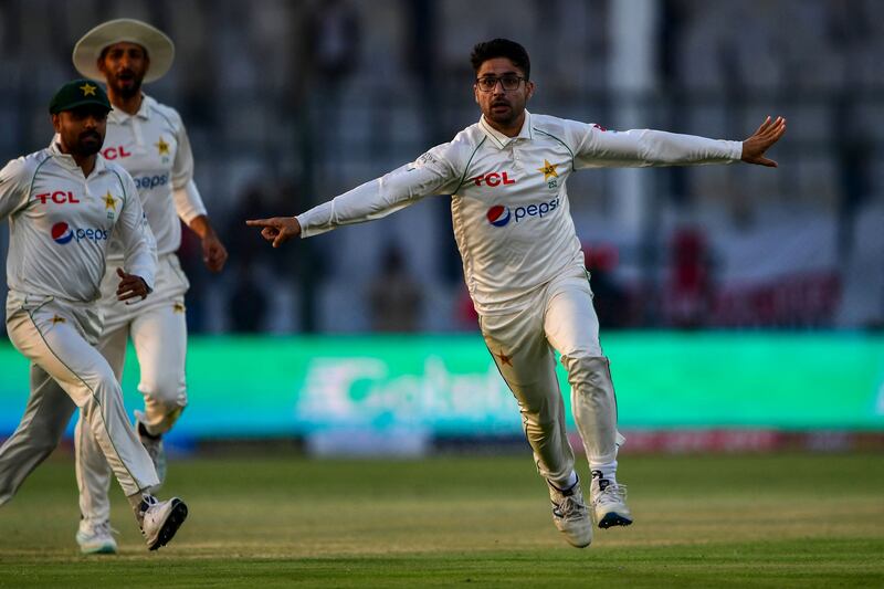 Pakistan's Abrar Ahmed celebrates after taking wicket of England's Zak Crawley. AFP