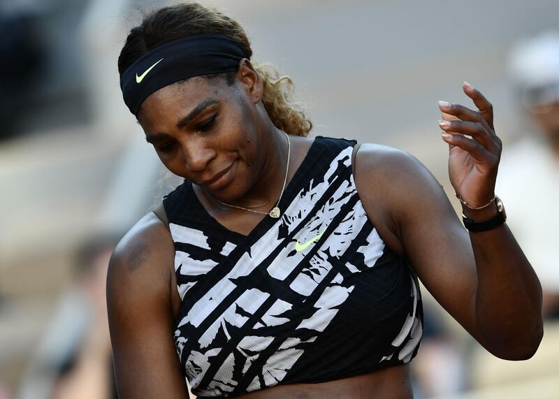 TOPSHOT - Serena Williams of the US reacts during her women's singles third round match against Sofia Kenin of the US, on day seven of The Roland Garros 2019 French Open tennis tournament in Paris on June 1, 2019. / AFP / Philippe LOPEZ
