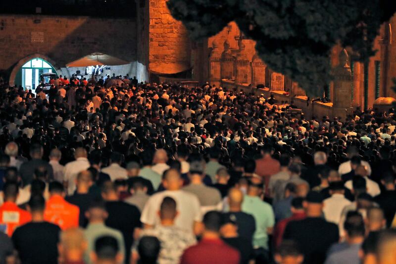 Worshippers gather to seek Laylat Al Qadr or the Night of Destiny outside the Dome of the Rock in Jerusalem's Al Aqsa Mosque compound. AFP
