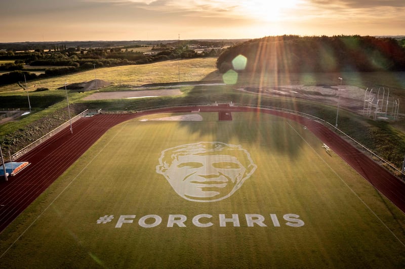 A giant portrait of Danish professional cyclist Chris Anker Soerensen at the Holbaek Sports Village in Denmark. Soerensen died in 2021, after being struck by a van while cycling. AFP