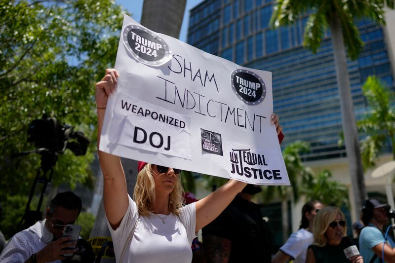 Trump supporters rally at a US courthouse in Miami. AP