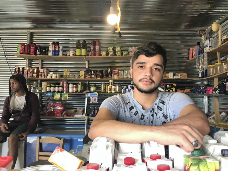 Palestinian Yaqoob Fatayer, 23, manages the Umm Adnan Grocery at the Ritsona refugee camp in Greece.  As a single man he expects a long wait before placement and has been in Greece for 18 months. September 14 2018. Anna Zacharias / The National