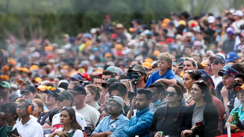 Spectators watch the second practice session of the Australian Grand Prix in Melbourne. AP
