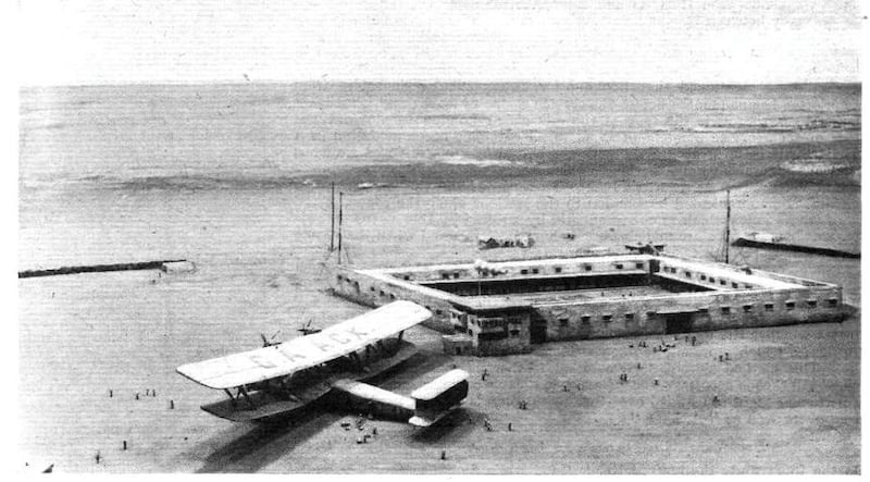 An extension was added to the rest house in 1939 as a result of increased personnel during the Second World War. This image shows the landing of a Hannibal class plane in 1933. The runway was converted into a road, now known as King Abdul Aziz Street, in the 1960s, while the airstrip remained in use until the Sharjah International Airport opened in 1977. Photo: Flight Magazine