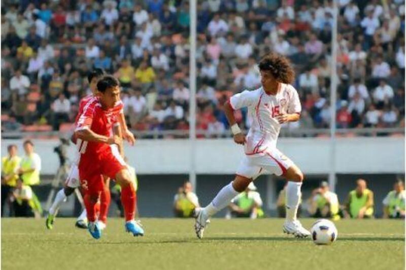 Omar Abdulrahman, the UAE midfielder, dictates play against North Korea in Pyongyang yesterday.