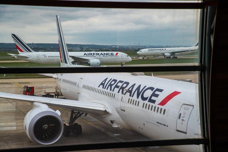 epa09130174 An Air France Boeing 787 bound for Bogota, Colombia,  awaiting loading  of Chinese vaccine SinoVac in Roissy Airport, near Paris, 11 April 2021 (issued 12 April 2021). Airline company Air France KLM Cargo, operated two flies to Cameroon and Colombia with a shipment of Chinese covid19 vaccines SinoPharm and SinoVac through its cargo area of Roissy airport (CDG).  EPA/CHRISTOPHE PETIT TESSON