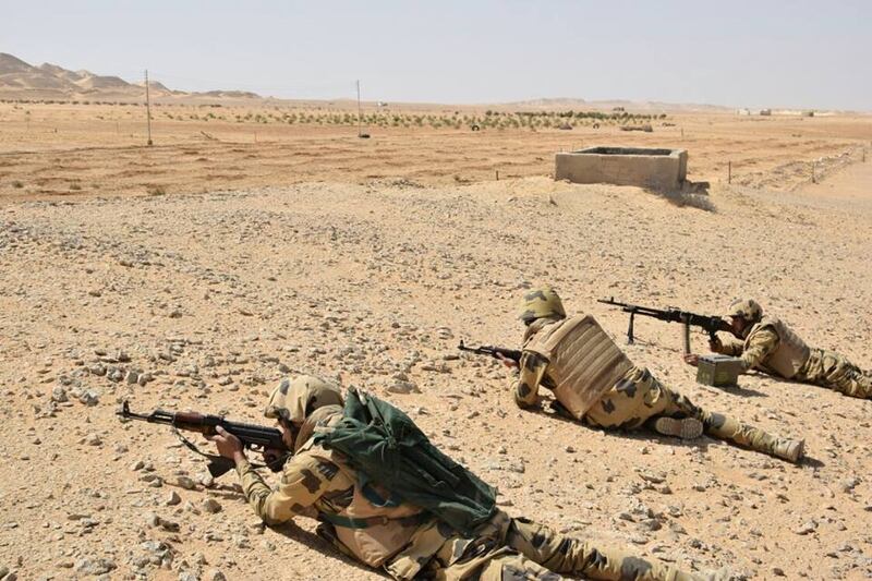 Egyptian Army soldiers are seen in the troubled northern part of the Sinai peninsula during a launch of a major assault against militants, in Al Arish, Egypt, in this undated handout picture made available by the Ministry of Defence March 4, 2018. Ministry of Defence/Handout via REUTERS ATTENTION EDITORS - THIS IMAGE WAS PROVIDED BY A THIRD PARTY. NO RESALES. NO ARCHIVES