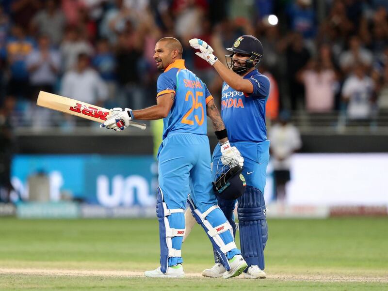 Dubai, United Arab Emirates - September 23, 2018: India's Shikhar Dhawan makes 100 during the game between India and Pakistan in the Asia cup. Sunday, September 23rd, 2018 at Sports City, Dubai. Chris Whiteoak / The National