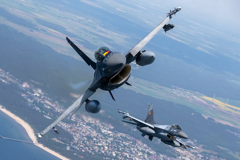 Romanian and Portuguese air force F-16 fighter jets take part in Nato's Baltic Air Policing Mission over Lithuanian airspace in May. AP