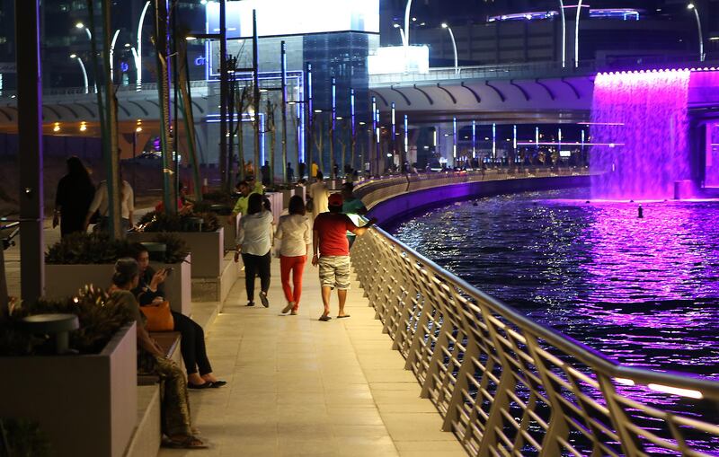 DUBAI , UNITED ARAB EMIRATES – May 17 , 2017 : People spending time with their family and friends during the evening at Dubai Water Canal in Dubai. ( Pawan Singh / The National ) For News / Photo Feature. ID No :- 18945
 *** Local Caption ***  PS1705- DUBAI CANAL30.jpg