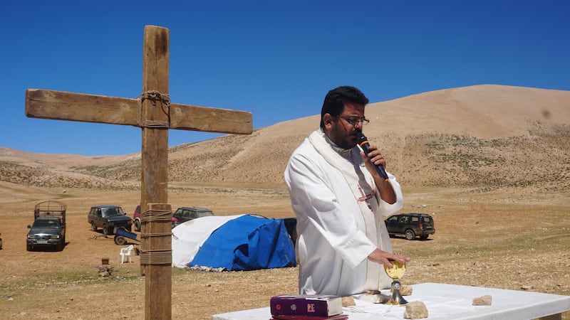 Priest Hani Tawk celebrates mass on Qornet Al Sawda, Lebanon, August 9, 2020. Photo by Aram Abdo