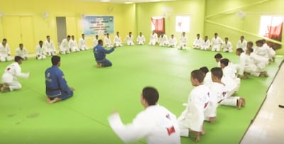 Jiu jitsu students are put through their paces at the refugee camp