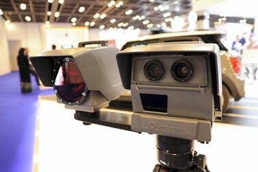 Speed cameras on display at the Gulf Traffic Conference held at Dubai World Trade Centre. Pawan Singh / The National