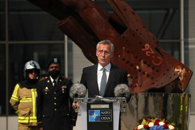 FILE - In this Friday, Sept. 11, 2020 file photo, NATO Secretary General Jens Stoltenberg speaks during a ceremony marking the 19th anniversary of the Sept. 11 attacks, at NATO headquarters in Brussels. NATO Secretary-General Jens Stoltenberg warned Tuesday, Nov. 17, 2020 that the military organization could pay a heavy price for leaving Afghanistan too early, after a U.S. official said President Donald Trump is expected to withdraw a significant number of American troops from the conflict-ravaged country in coming weeks. (AP Photo/Francisco Seco, Pool, File)