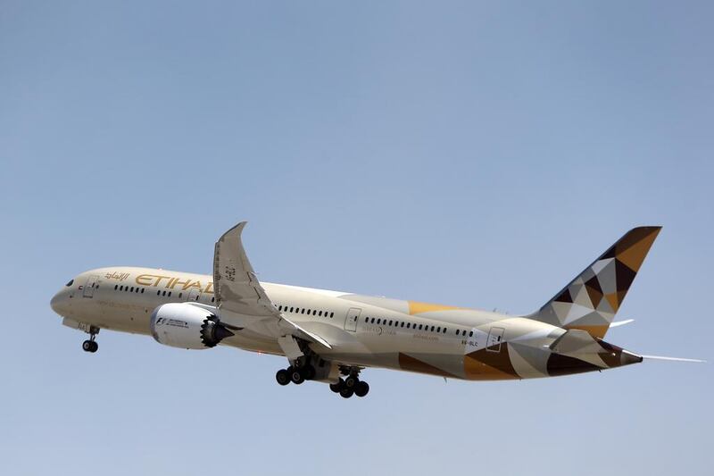 Abu Dhabi's Etihad Airways plans to second some of its pilots to Dubai-based Emirates, as the two airlines seek to deepen collaboration. Delores Johnson / The National