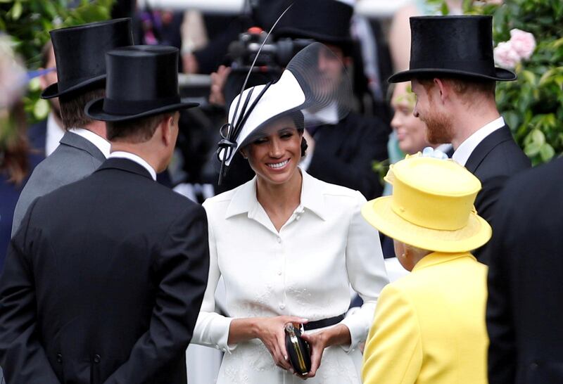 FILE PHOTO: Horse Racing - Royal Ascot - Ascot Racecourse, Ascot, Britain - June 19, 2018   Britain's Prince Harry, Meghan, the Duchess of Sussex and Britain's Queen Elizabeth arrive at Ascot racecourse   REUTERS/Paul Childs//File Photo
