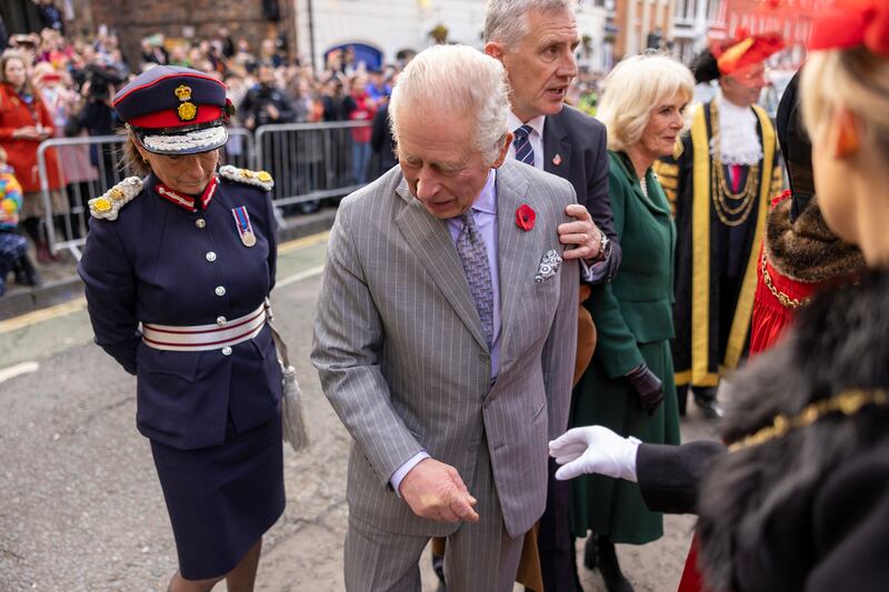 Britain's King Charles III reacts after an egg was thrown in his direction during a ceremony in York, northern England in 2022 as part of a two-day tour of Yorkshire. AFP