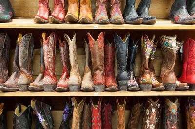 14 Nov 2013, Austin, Texas, USA --- Cowboy boots lining the shelves, Austin, Texas, United States of America, North America --- Image by © Gavin Hellier/Robert Harding World Imagery/Corbis